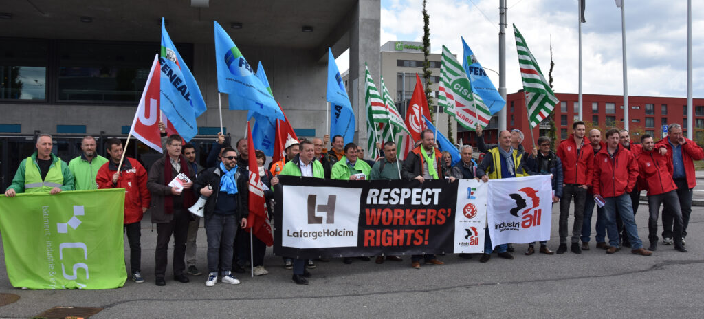 Photo of union action in front of the building where LafargeHolcim annual shareholders meeting took place, May 2017