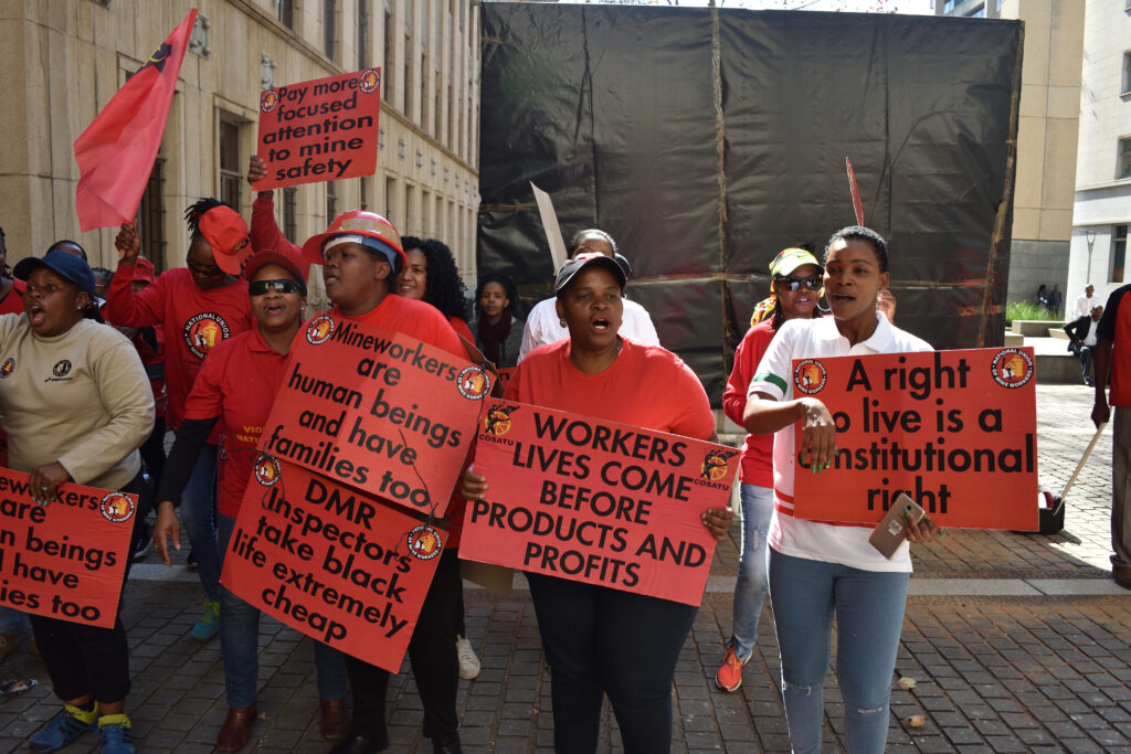 Workers demonstrate for health and safety at the Chamber of Mines in Johannesburg.