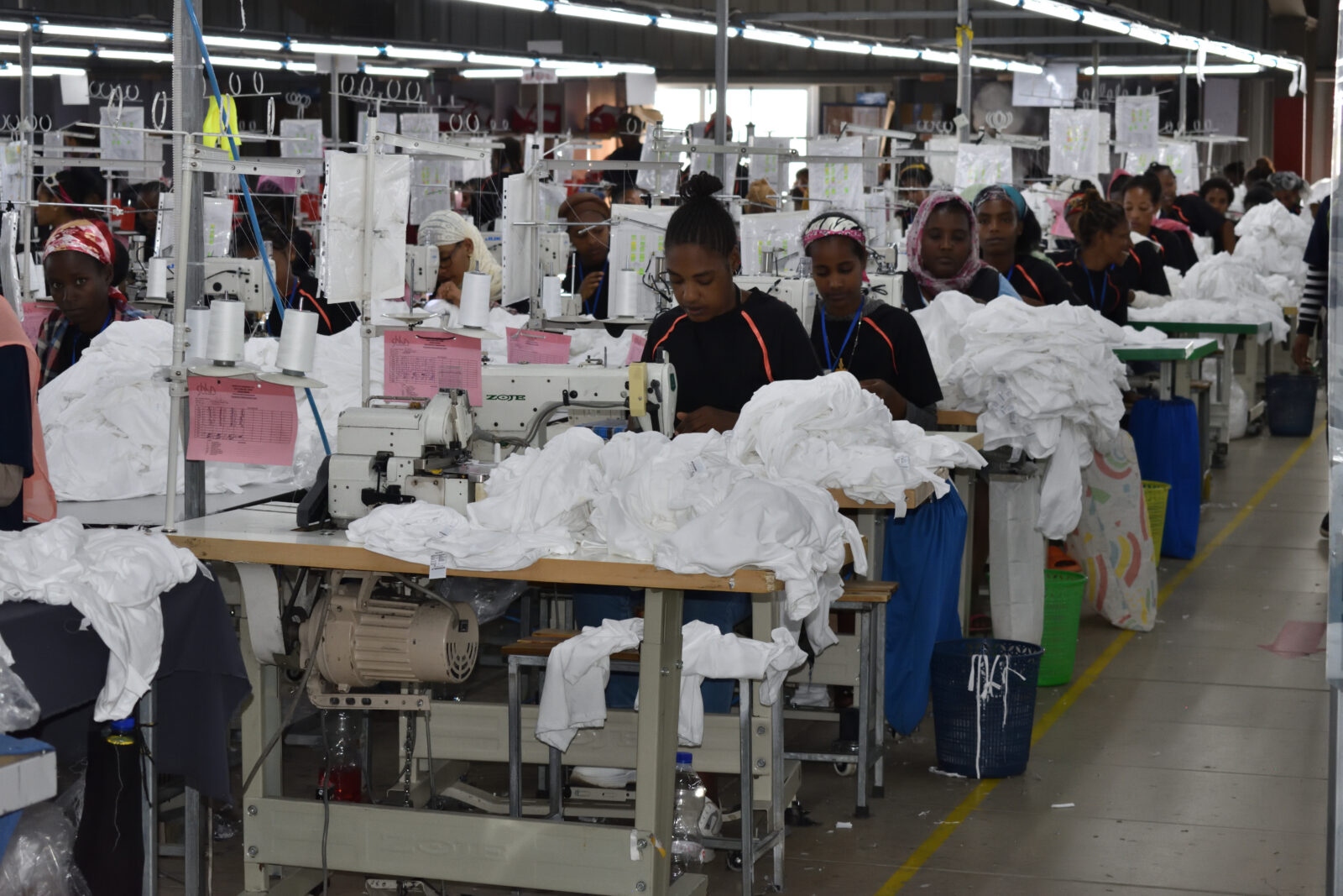 Garment workers at sewing machines in a factory in Ethiopia