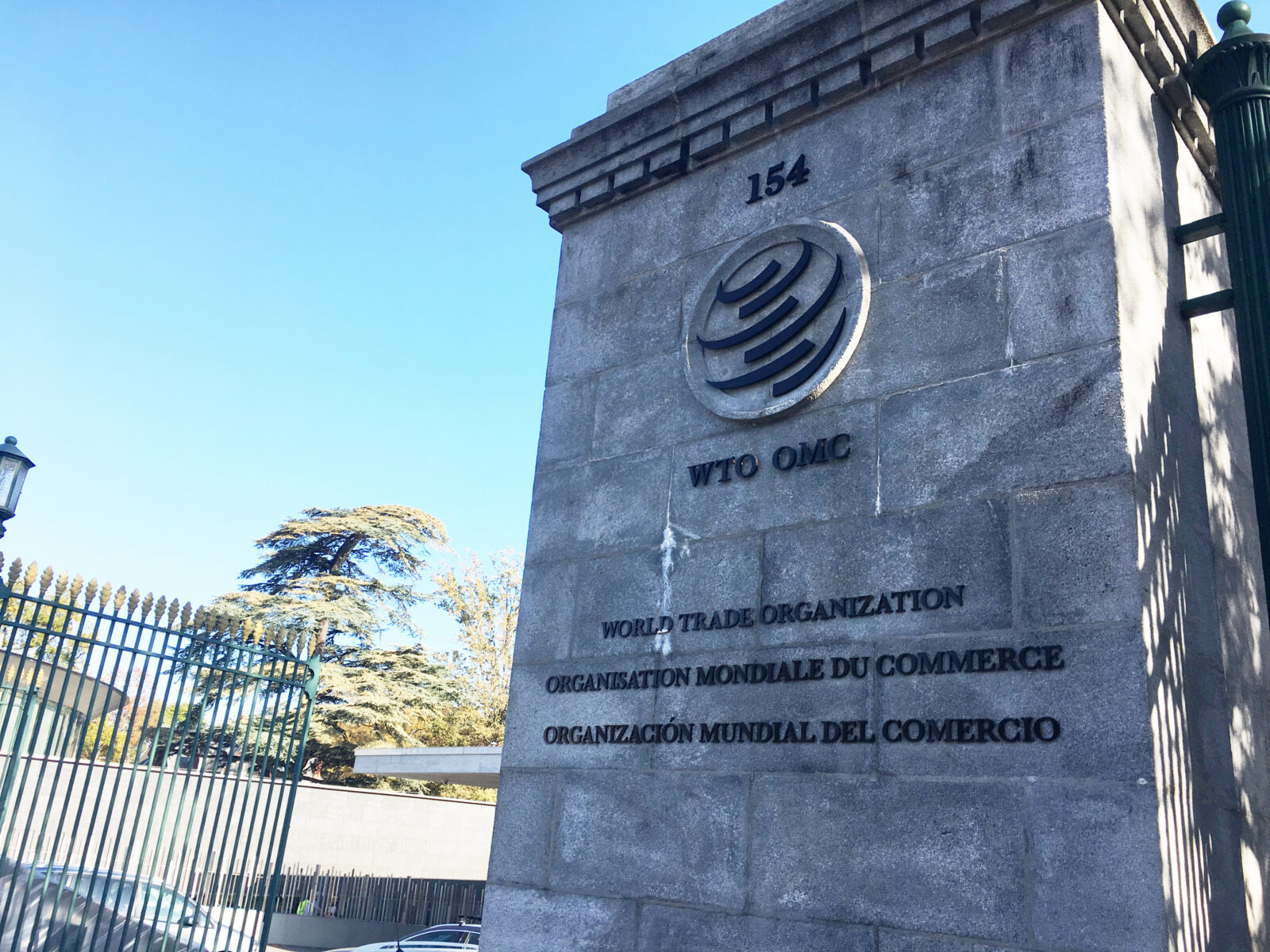 WTO headquarters entrance sign in Geneva, Switzerland