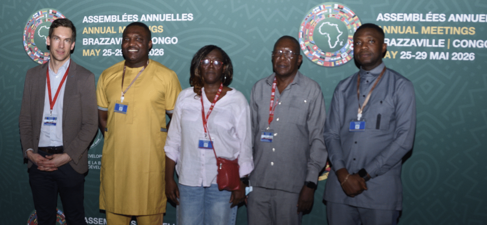 Five members of the union delegation stand in front of the African Development Bank annual meetings backdrop in Brazzaville, Congo, May 2026.