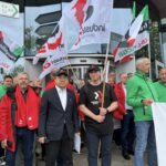 IndustriALL leaders stand with steel workers outside ArcelorMittal AGM, Luxembourg, 5 May 2026