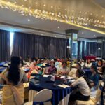Delegates in session at the national women's meeting