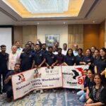 Participants and facilitators celebrate the completion of IndustriALL's national youth workshop.