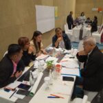 organizers collaborate in small group session, Jakarta