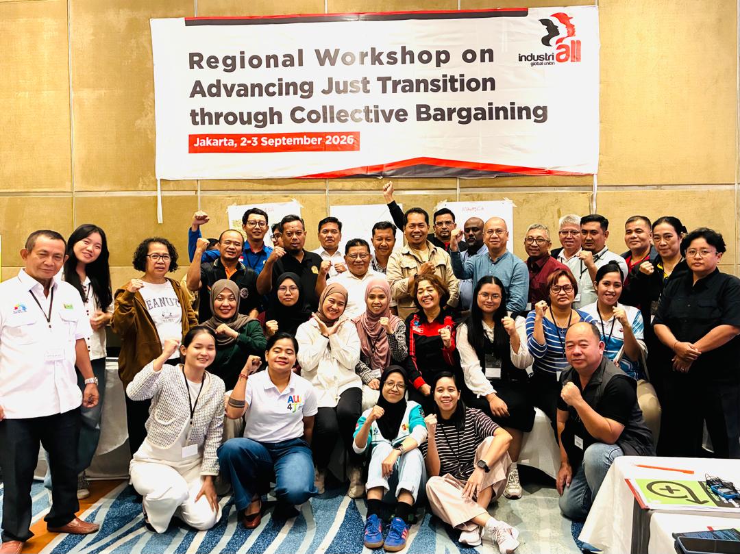 Group photograph of 35 trade unionists from Malaysia, Indonesia, Thailand and the Philippines at a regional workshop on just transition through collective bargaining in Jakarta, 2-3 September 2026. Participants stand together in front of a banner displaying the workshop title and IndustriALL logo.