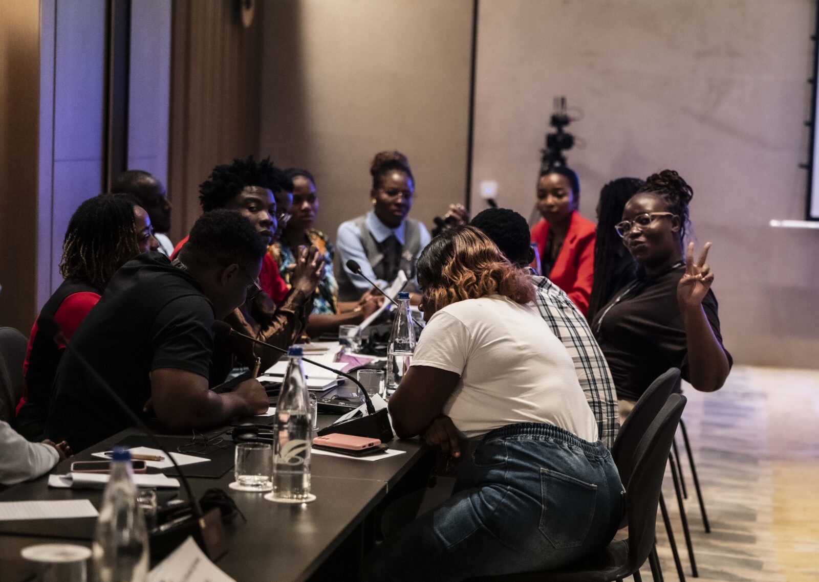 Young trade unionists sit together in a working group discussion at the IndustriALL sub-Saharan Africa youth workshop in Abidjan, Côte d'Ivoire.