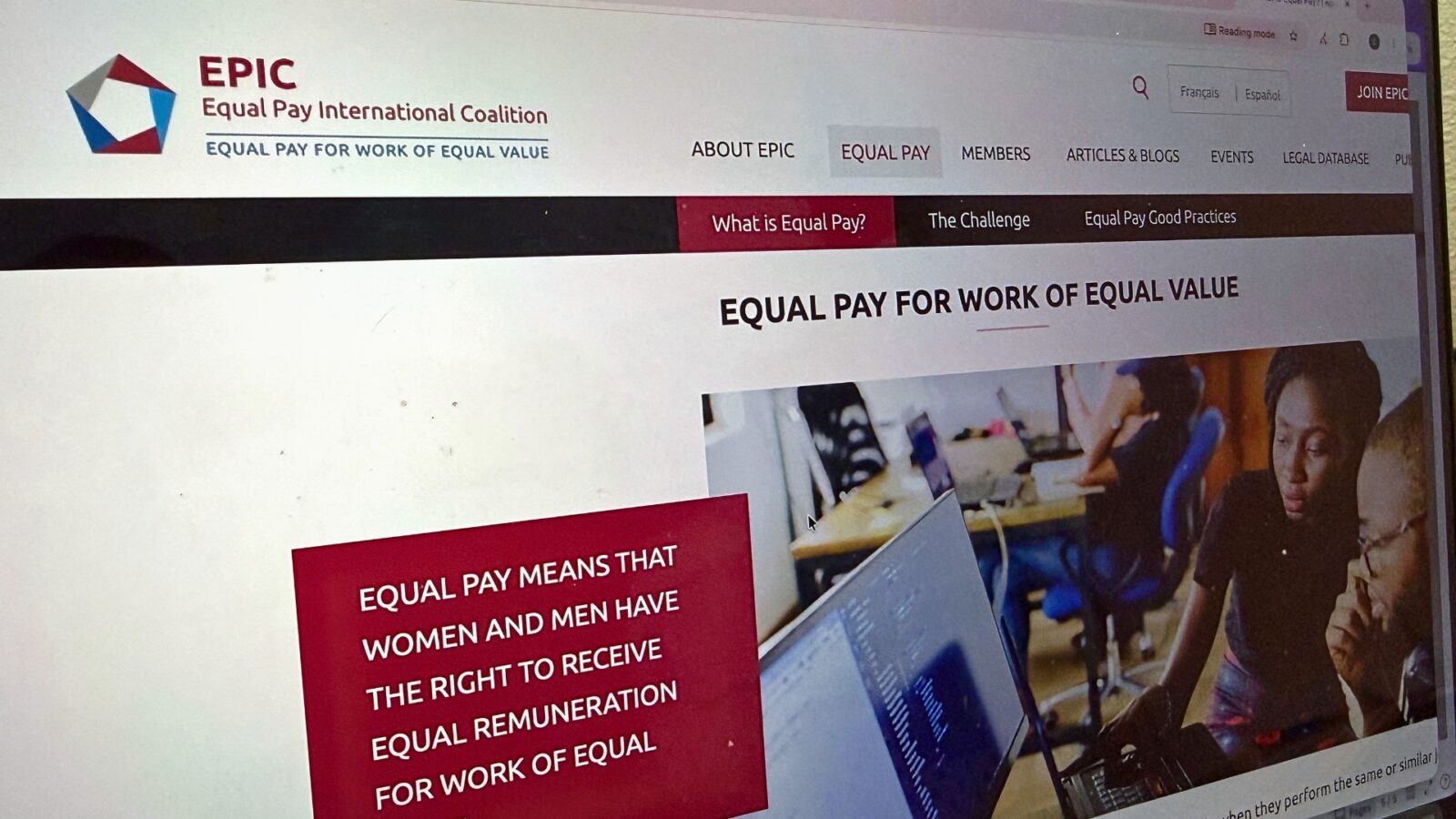 Laptop screen showing the Equal Pay International Coalition (EPIC) website, which promotes pay equity and equal pay for work of equal value