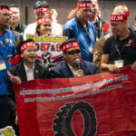 Saman Pornprachatham, president of the Rubber Workers Union Group of Thailand (RWUT) sgetting support from participants for the the ratification of ILO conventions