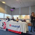 Diana addresses participants at the battery supply chain conference in Bratislava, Slovakia, on 20-21 October 2026, as three panellists look on.
