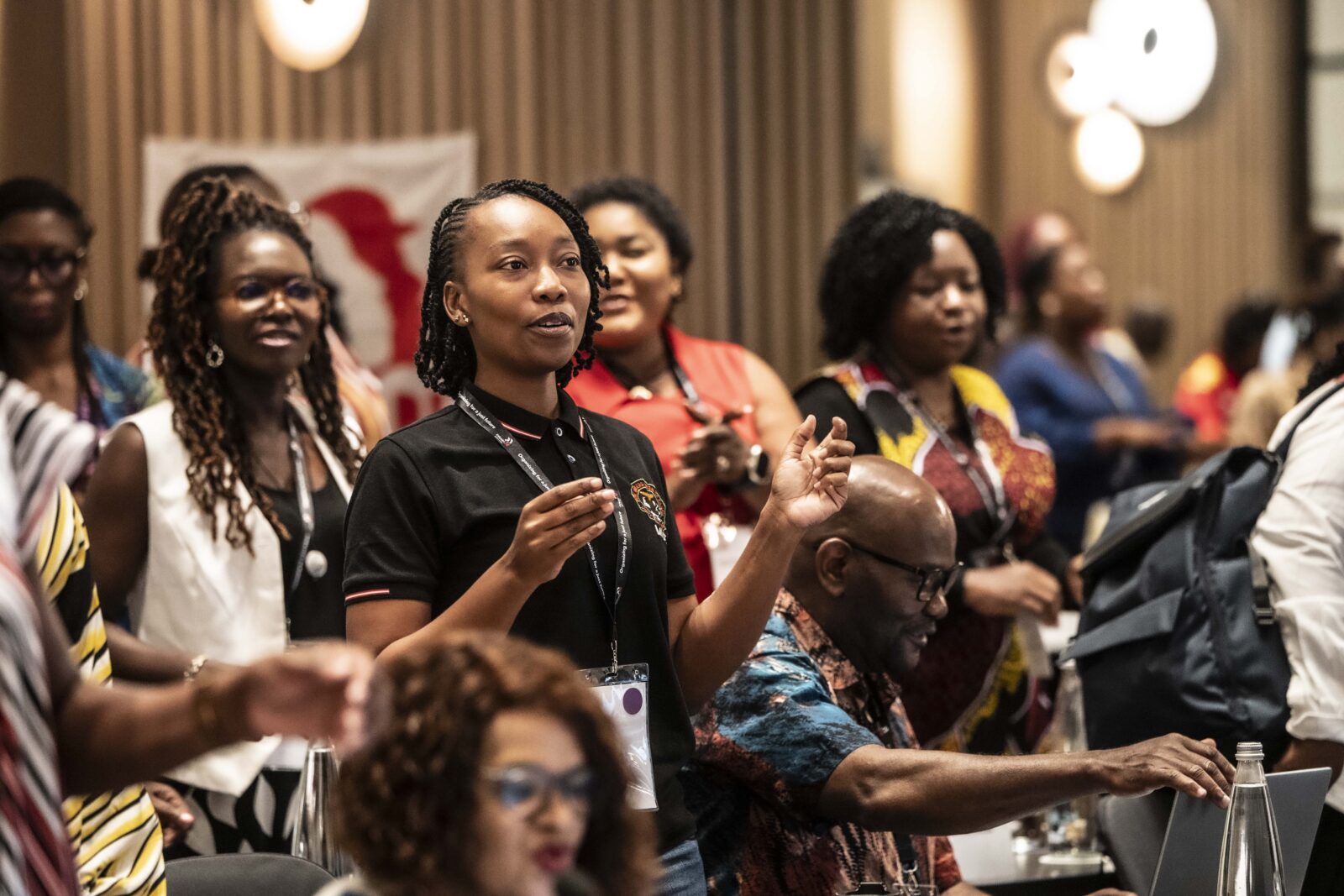 Women in mining Conference in Abidjan, women dance and sing as they open the meeting