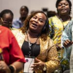Women in mining Conference in Abidjan, women dance and sing as they open the meeting
