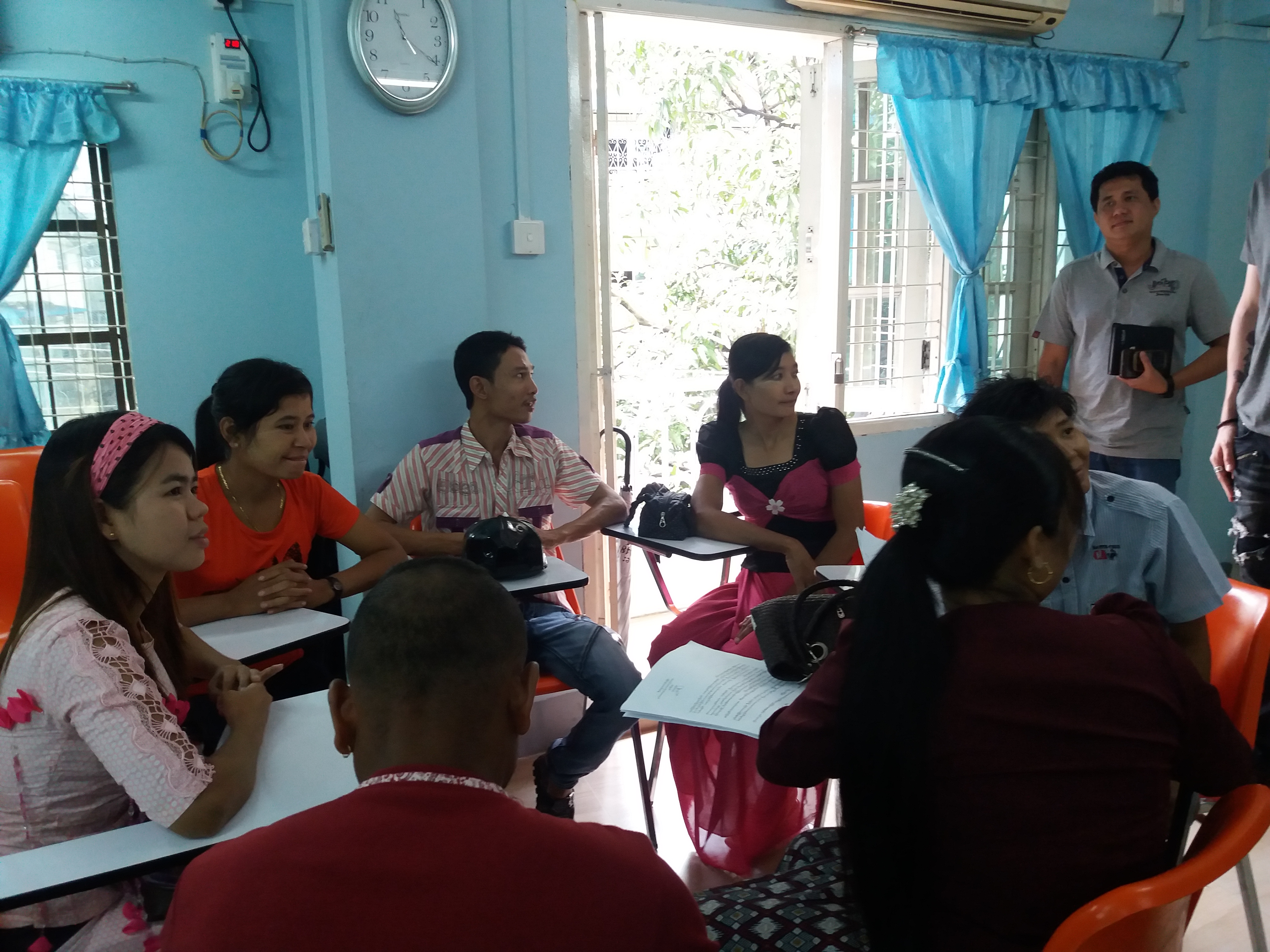 Participants discussing maternity protection. 