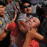 Violence by police against workers