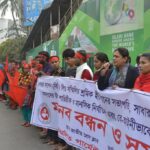 Sommilito Garments union president, Nazma Akhter, leads a demonstration against Donglian before the agreement was made. 