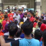NGWF President Amirul Haque Amin addresses workers at the Ajanta factories in Dhaka, Bangladesh.