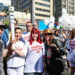 Акция протеста бразильских профсоюзов во время церемонии несения факела