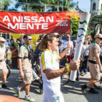 Акция протеста бразильских профсоюзов во время церемонии несения факела