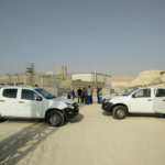 INGL workers use their vehicles to block the entrance to the Sodom station, on 22 September 2016. 