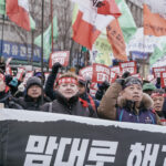 Кемперле участвует в пятитысячном митинге в Сеуле, 23 января. Фото: IndustriALL/Джун Майкл Парк 