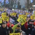Демонстрация в поддержку южнокорейских профсоюзов