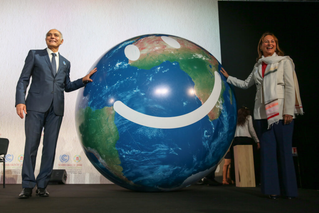 Salaheddine Mezouar, COP 22/CMP 12 President, and Ségolène Royal, COP 21/CMP 11 President, welcome delegates to the Marrakech Climate Change Conference. Photo by IISD/Kiara Wort