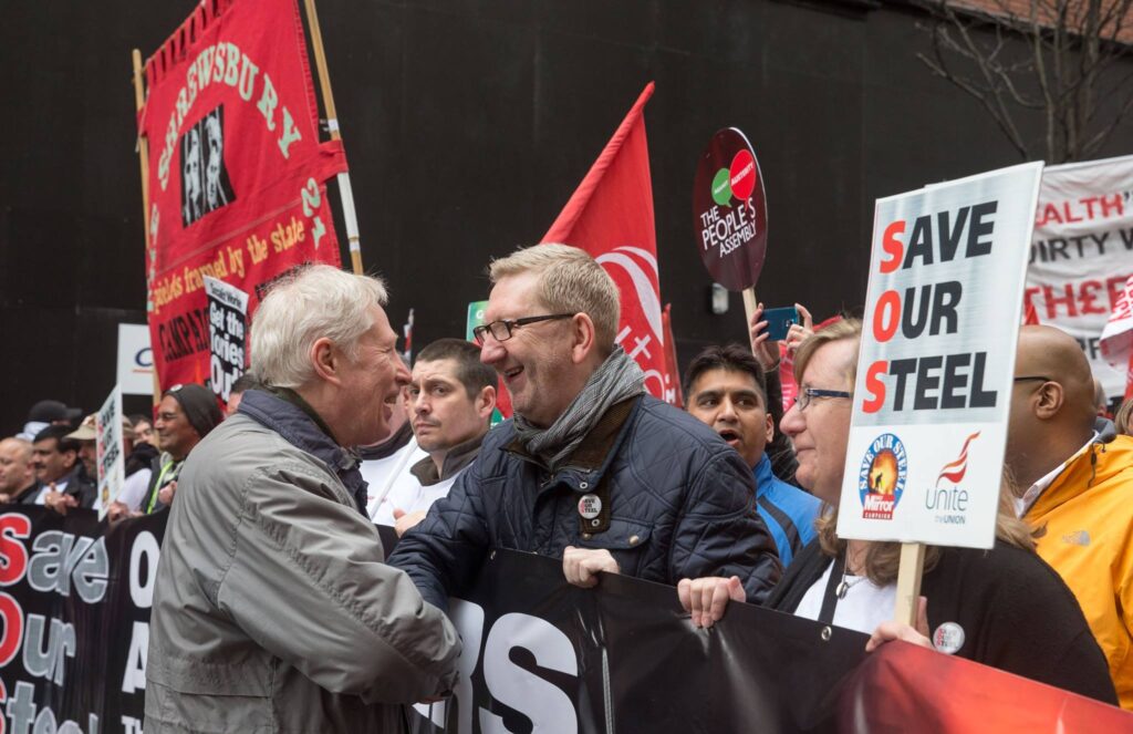 Len McCluskey of Unite marches with steel workers in London