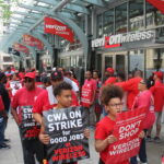 Protestors have organized pickets at 300 Verizon stores in the USA. 