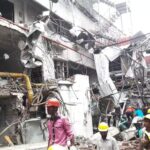 Rescuers at the Multifabs factory search for survivors following a deadly explosion.