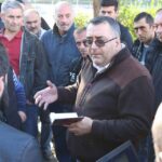 Tamaz Dolaberidze, President of Trade Union of Metallurgy, Mining and Chemical Industry Workers of Georgia, with protesters