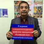 Члены Горно-металлургического профсоюза Кыргызской Республики со знаком солидарности