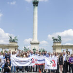 Participants of #ALLComms at Heroes' Square in Budapest