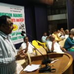 С.К. Зама, представитель Индийской национальной федерации рабочих-металлистов, членской организации Глобального союза  IndustriALL, выступает на форуме 23 июля.