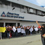 Amertron workers protest outside the company premises on 25 September