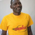 A TUMEC representative at a public meeting