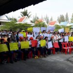 Members of IndustriALL's Thai affiliate, Team, protest against Mitsubishi