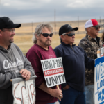 Members of L-D239, their families, friends and the community man the picket line in the early hours of a September morning, ready to greet the incoming shift of scabs.