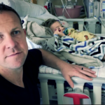 Brian Harvey with his young son