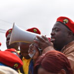 Wander Mkhonza, ATUSWA, secretary general addresses an organizing rally at Nhlangano.