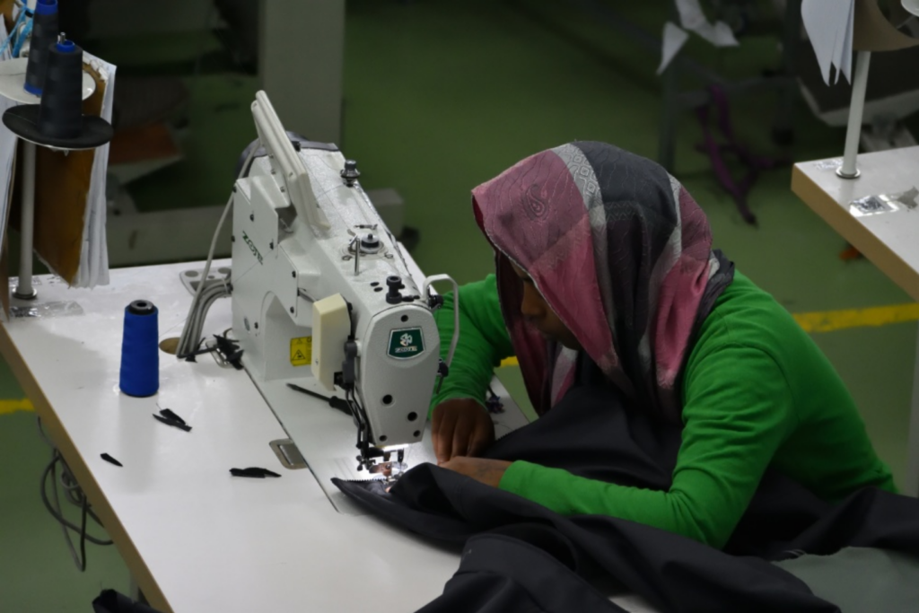 Workers sew garments at Shints factory, Bole Lemi industrial park, Addis Ababa 2018.