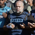Al Jazeera's bureau chief in Gaza, Wael Al-Dahdouh prays during the funeral of his son Hamza Wael Dahdouh, a journalist with the Al Jazeera television network, who was killed in a reported Israeli air strike in Rafah in the Gaza Strip on January 7, 2024. Credit: AFP.