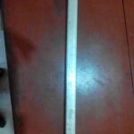 The metal bar used in the attack. 