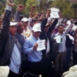 Des dirigeants syndicaux s’adressent au public réuni près du Parc de la Liberté. Photo publiée avec l’aimable autorisation de LICADHO