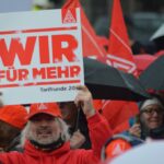 An IG Metall unionist protests in Augsburg, Germany. Source: IG Metall