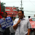 Protestors demanding reinstatement of illegally dismissed colleagues