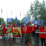 Protestors demanding reinstatement of illegally dismissed colleagues