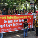 Участники акции в поддержку уволенных рабочих Ansell.