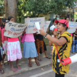 Участники акции в поддержку уволенных рабочих Ansell.