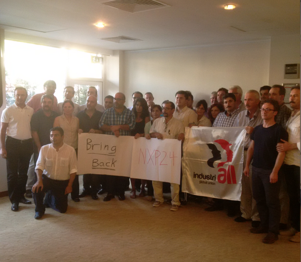 Participants at the workshop showing support for the workers at NXP, Phillipines.