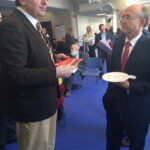 Kemal Özkan hands Rio Tinto chairman Jan du Plessis an Unsustainability leaflet